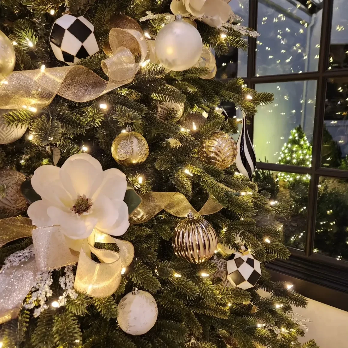 Decorated Christmas tree with gold and white ornaments