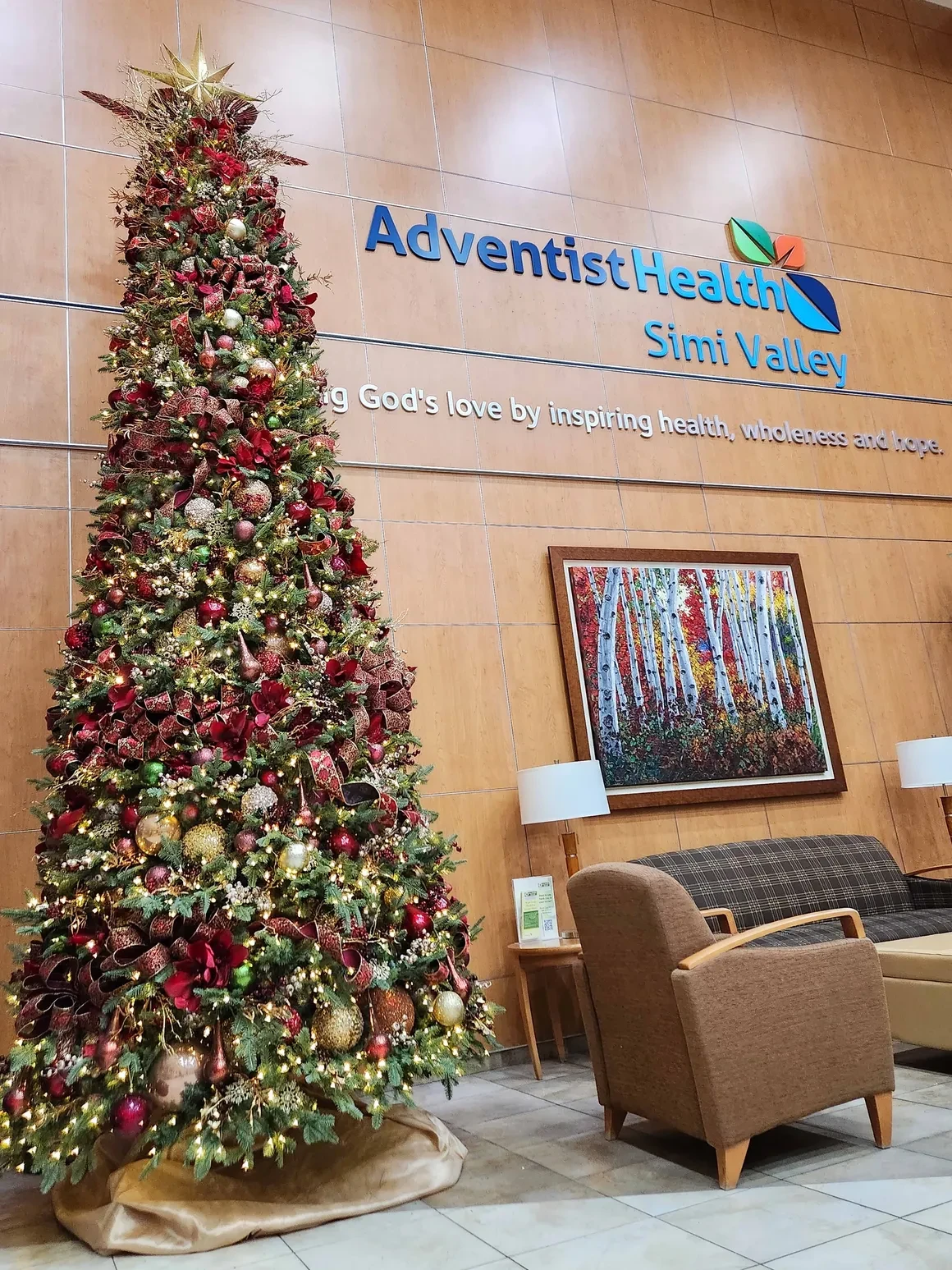 Decorated Christmas tree in hospital lobby
